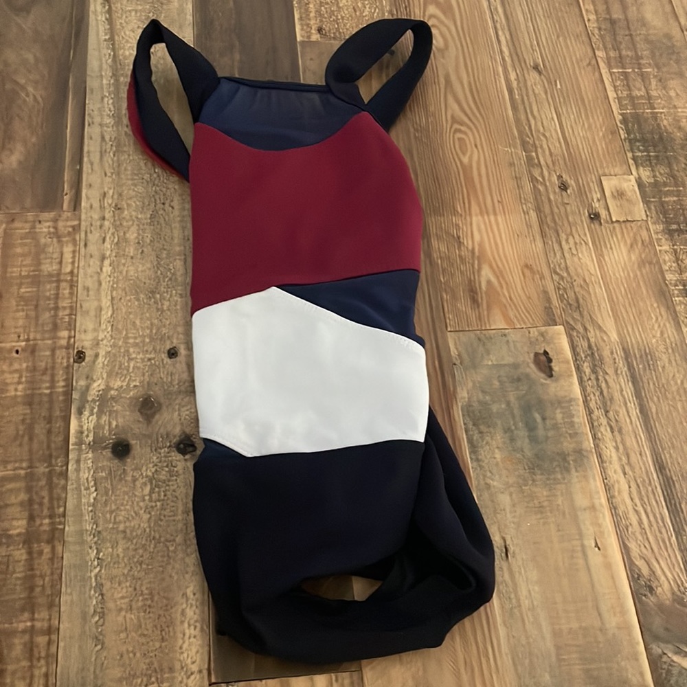 This is a multi colored leo from Five Dancewear. It’s a size YXL.